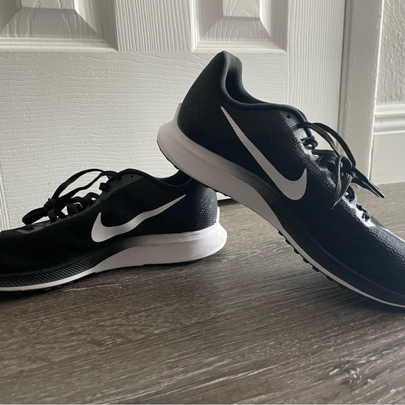 Nike Shoes - Nike Women Pegasus Black and White Athletic Shoes - size 10